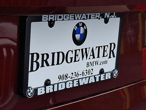 Aventurin Red Metallic 2026 BMW iX xDrive45