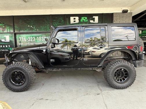 Black Clearcoat 2014 Jeep Wrangler Unlimited Sport