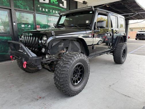 Black Clearcoat 2014 Jeep Wrangler Unlimited Sport
