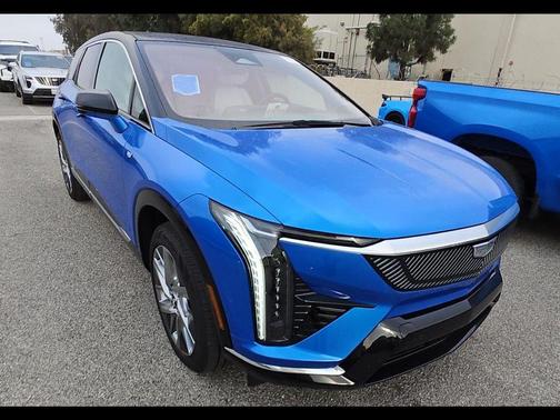 Coastal Blue Metallic 2025 Cadillac OPTIQ Luxury 1 AWD