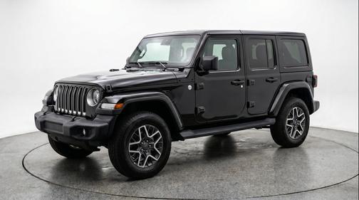 Black Clearcoat 2025 Jeep Wrangler 4-Door Sahara 4x4
