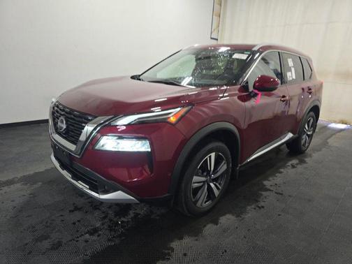 Red 2023 Nissan Rogue Platinum