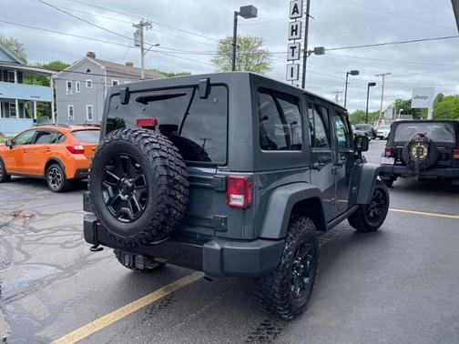 Photo 3 of 17 of 2017 Jeep Wrangler Unlimited Sport