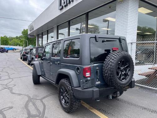 Photo 5 of 17 of 2017 Jeep Wrangler Unlimited Sport