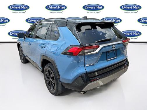 Cavalry Blue/Midnight Black Metallic 2024 Toyota RAV4 Hybrid SE