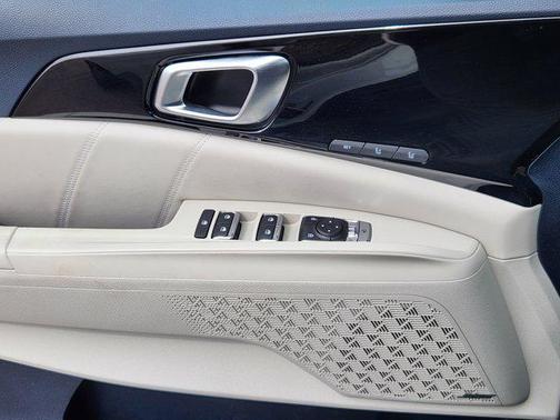 Ivory Silver 2025 Kia Carnival SX Prestige