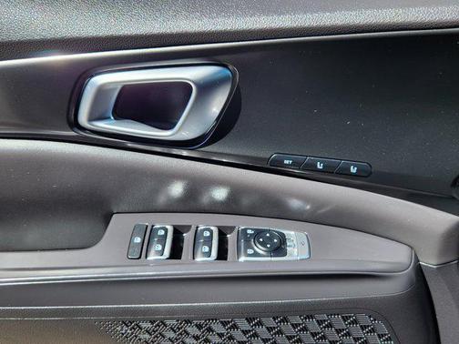 Ceramic Silver 2025 Kia Carnival Hybrid SX