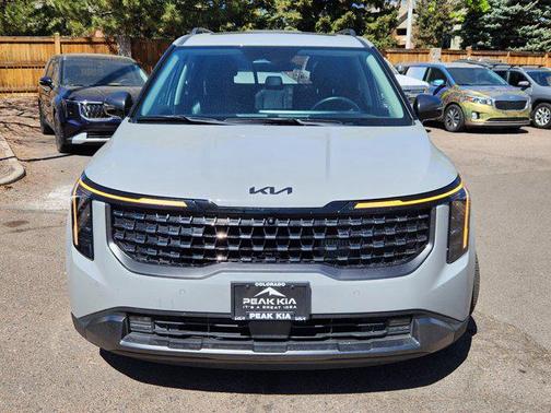 Ceramic Silver 2025 Kia Carnival Hybrid SX