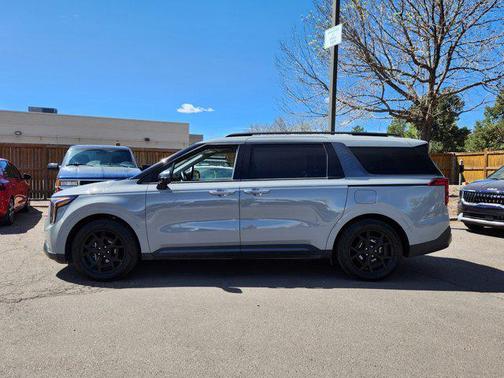 Ceramic Silver 2025 Kia Carnival Hybrid SX