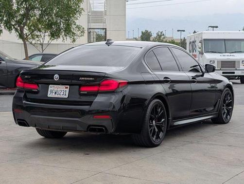 Black Sapphire Metallic 2023 BMW M550 i xDrive