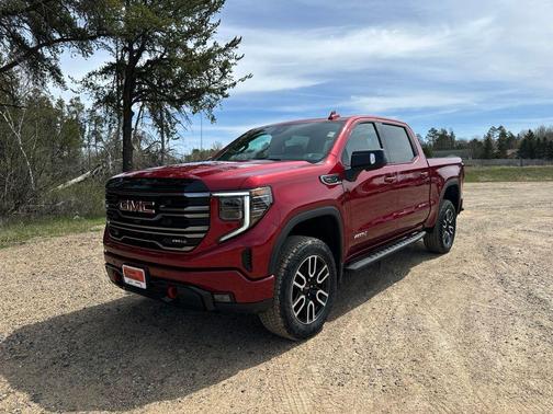 Volcanic Red Tintcoat 2026 GMC Sierra 1500 AT4