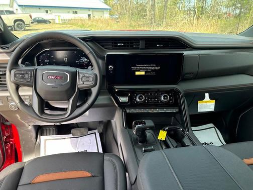 Volcanic Red Tintcoat 2026 GMC Sierra 1500 AT4