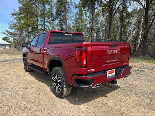 Volcanic Red Tintcoat 2026 GMC Sierra 1500 AT4