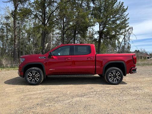 Volcanic Red Tintcoat 2026 GMC Sierra 1500 AT4