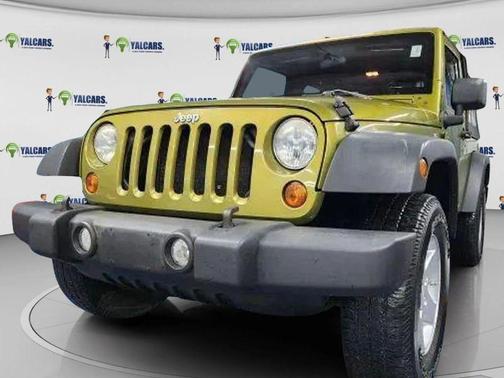 Rescue Green Metallic CC/Black Soft Top 2010 Jeep Wrangler Sport