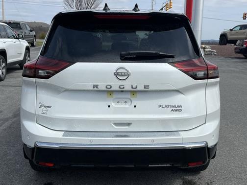 Everest White Pearl/Super Black 2026 Nissan Rogue Platinum