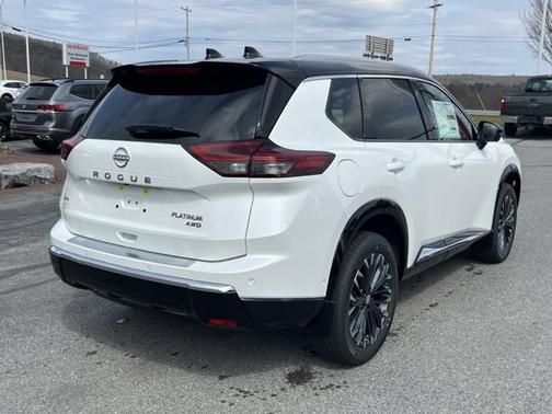 Everest White Pearl/Super Black 2026 Nissan Rogue Platinum
