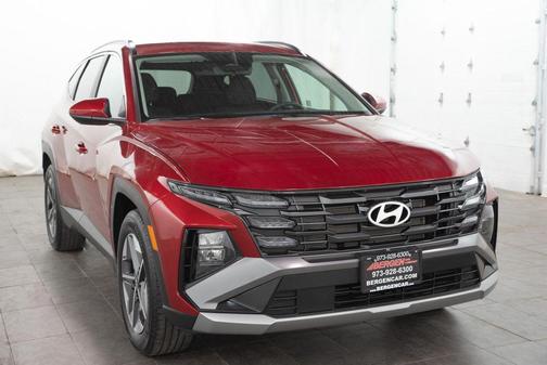 Red 2025 Hyundai TUCSON SEL