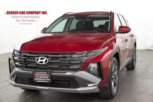 Red 2025 Hyundai TUCSON SEL