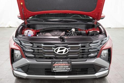 Red 2025 Hyundai TUCSON SEL