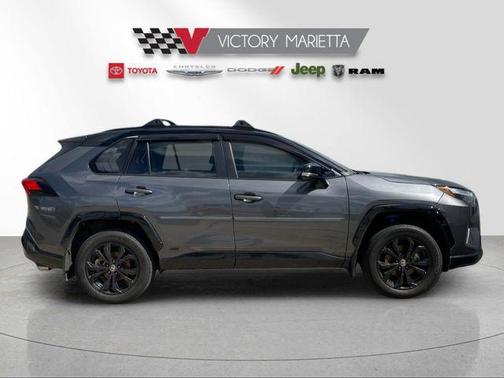 Midnight Black Metallic 2023 Toyota RAV4 Hybrid SE