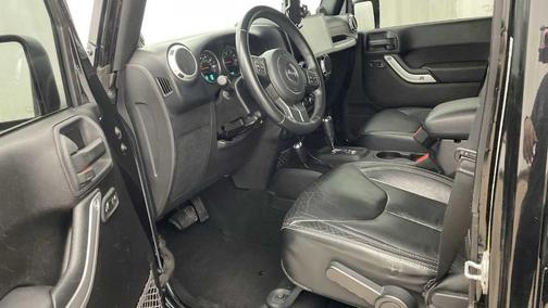 Black 2013 Jeep Wrangler Unlimited Sahara