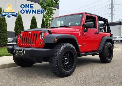 Red 2010 Jeep Wrangler Sport
