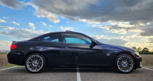 Black 2011 BMW 335 335i xDrive AWD 2dr Coupe