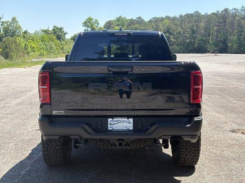 Diamond Black Crystal Pearlcoat 2026 RAM 1500 RHO Crew Cab 4x4 5'7' Box