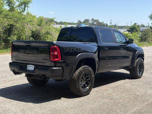 Diamond Black Crystal Pearlcoat 2026 RAM 1500 RHO Crew Cab 4x4 5'7' Box