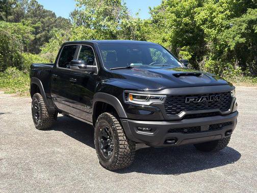 Diamond Black Crystal Pearlcoat 2026 RAM 1500 RHO Crew Cab 4x4 5'7' Box