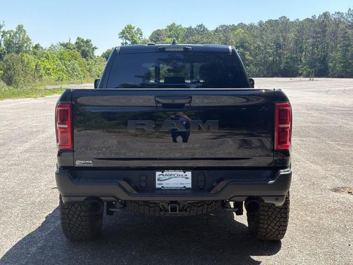 Diamond Black Crystal Pearlcoat 2026 RAM 1500 RHO Crew Cab 4x4 5'7' Box