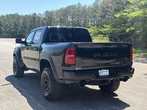 Diamond Black Crystal Pearlcoat 2026 RAM 1500 RHO Crew Cab 4x4 5'7' Box