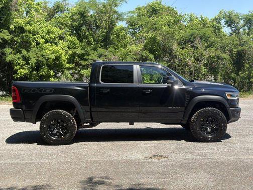 Diamond Black Crystal Pearlcoat 2026 RAM 1500 RHO Crew Cab 4x4 5'7' Box