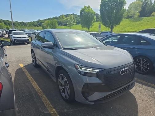 Pebble Gray 2025 Audi Q4 e-tron Sportback Prestige 55 quattro