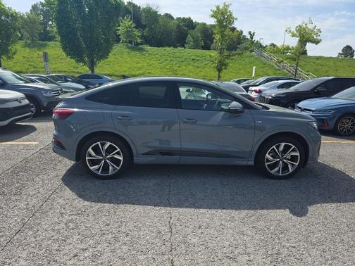 Pebble Gray 2025 Audi Q4 e-tron Sportback Prestige 55 quattro
