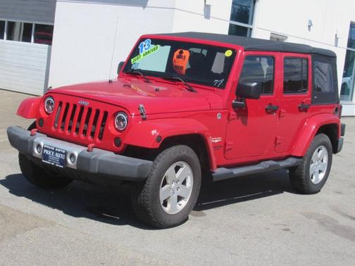 Red 2013 Jeep Wrangler Unlimited Sahara