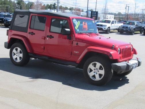Red 2013 Jeep Wrangler Unlimited Sahara