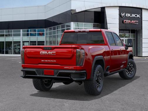 Volcanic Red Tintcoat 2026 GMC Sierra 2500 AT4X