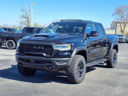 Diamond Black Crystal Pearlcoat 2026 RAM 1500 RHO Crew Cab 4x4 5'7' Box