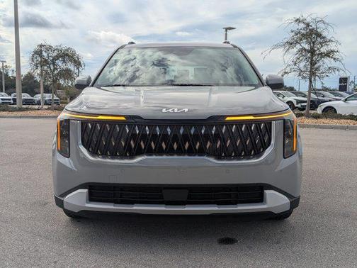 Ceramic Silver 2026 Kia Carnival Hybrid EX