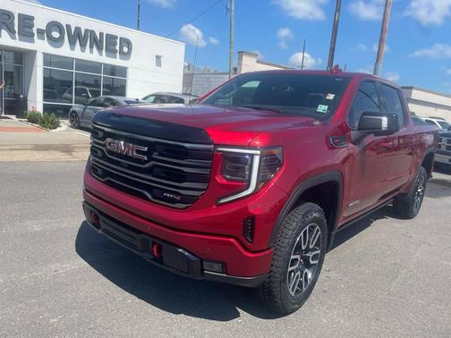 Volcanic Red Tintcoat 2025 GMC Sierra 1500 AT4