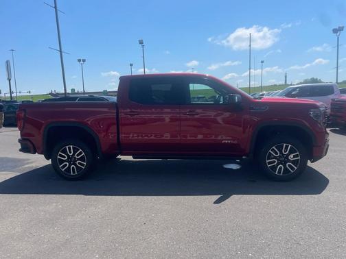 Volcanic Red Tintcoat 2025 GMC Sierra 1500 AT4