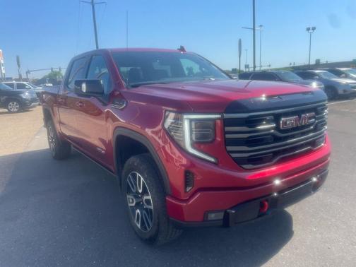Volcanic Red Tintcoat 2025 GMC Sierra 1500 AT4