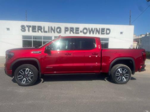 Volcanic Red Tintcoat 2025 GMC Sierra 1500 AT4