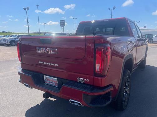 Volcanic Red Tintcoat 2025 GMC Sierra 1500 AT4