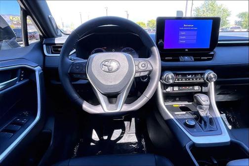 Wind Chill Pearl/Midnight Black Metallic 2024 Toyota RAV4 Hybrid SE