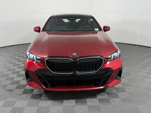 Red Metallic 2026 BMW 550e xDrive