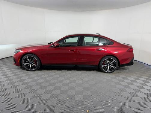 Red Metallic 2026 BMW 550e xDrive