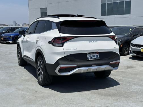 Snow White Pearl 2025 Kia Sportage Hybrid EX